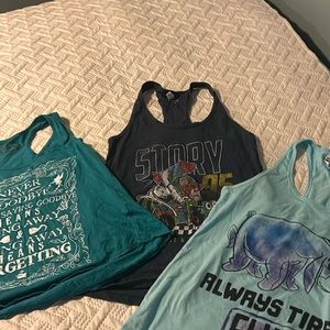 Three Disney tank tops